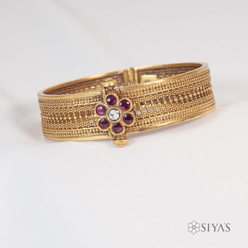 Intricated kada with red stone flower