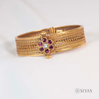 Intricated kada with red stone flower