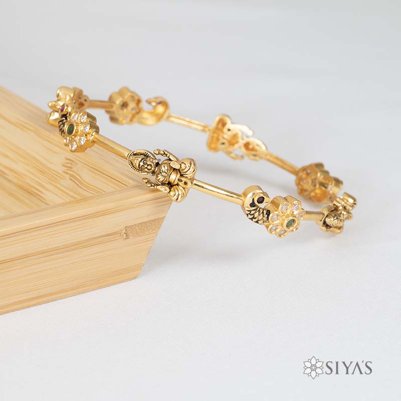 Lakshmi and peacock bangle
