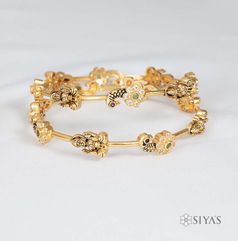 Lakshmi and peacock bangle