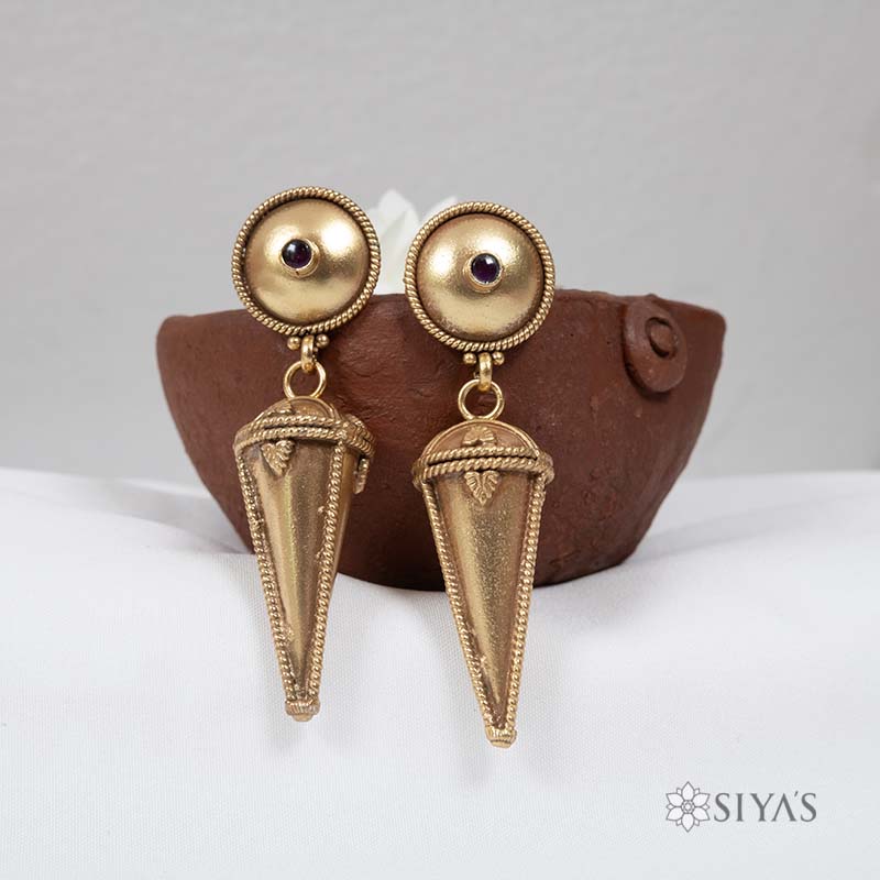 Tribal studs and drop