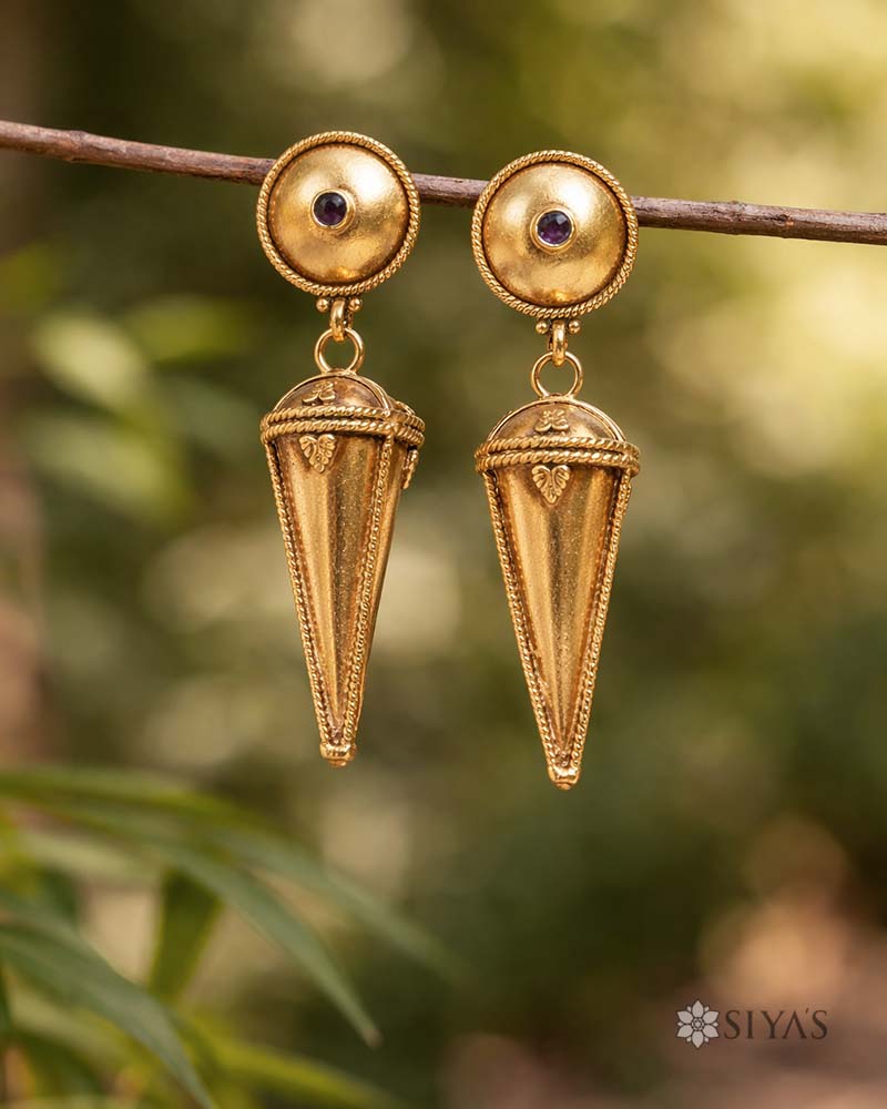 Tribal studs and drop