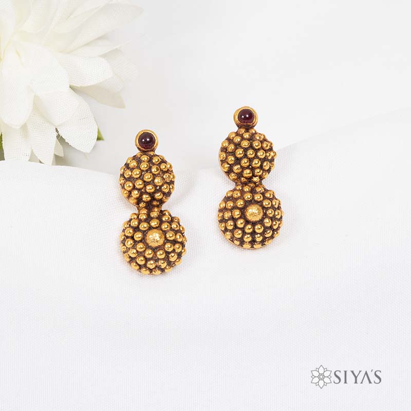 Gold studs