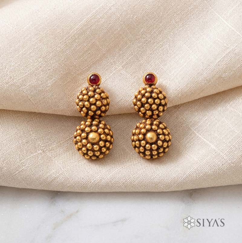 Gold studs