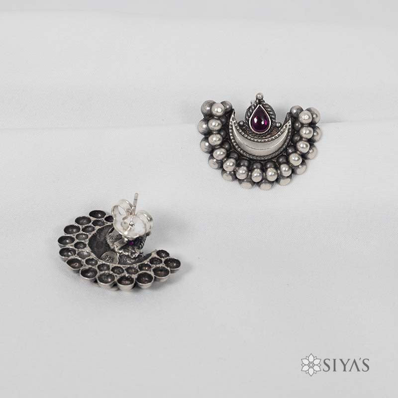 Moon shaped red stone studs