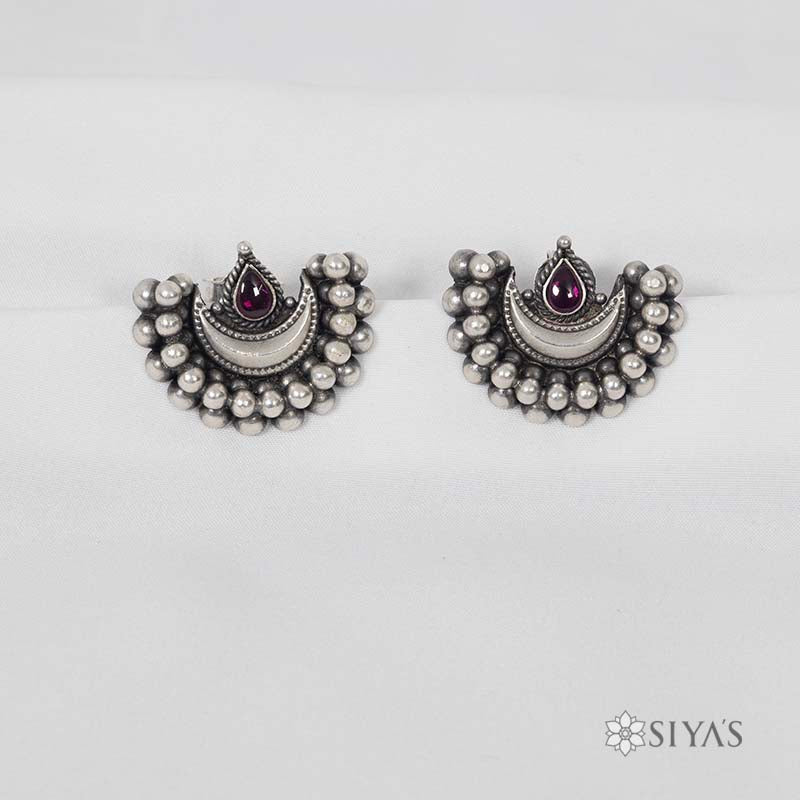 Moon shaped red stone studs