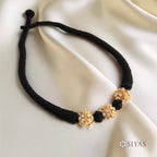 Black thread pearl gundu choker