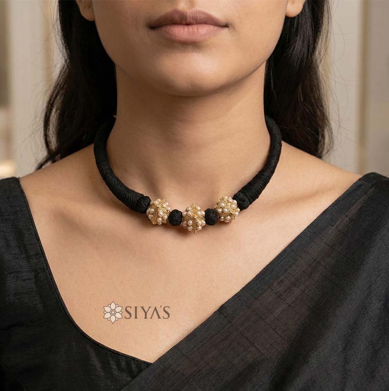 Black thread pearl gundu choker