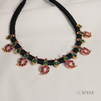 Black thread with mango design