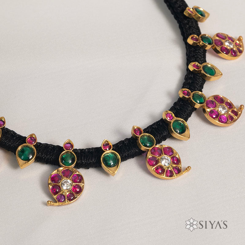 Black thread with mango design