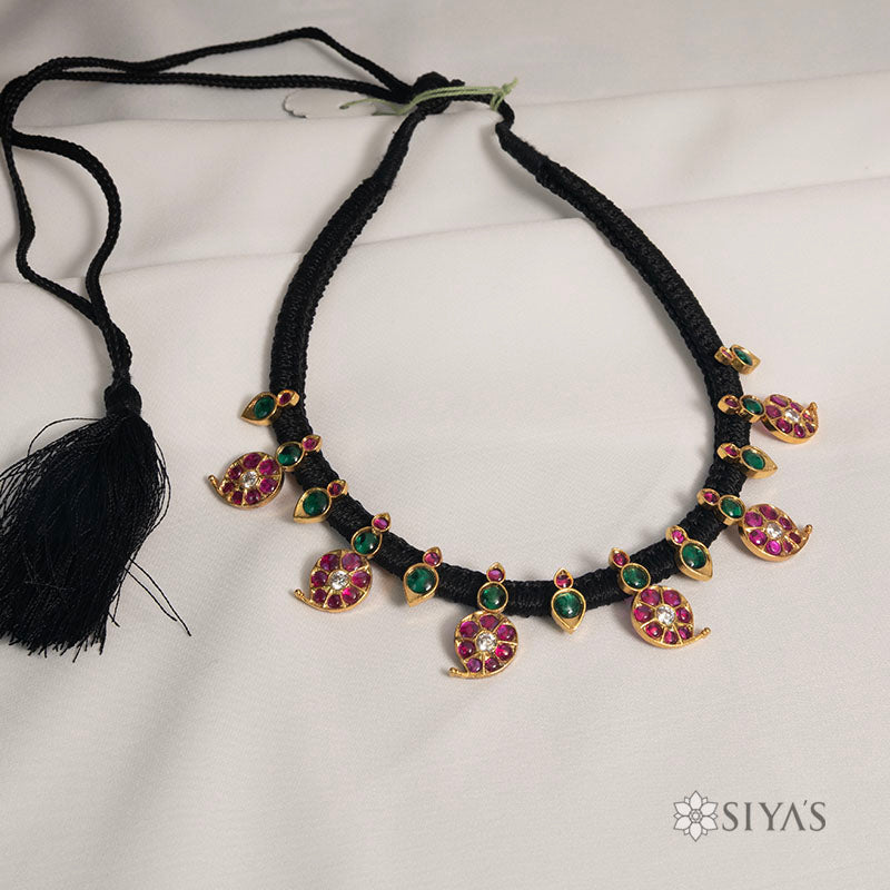 Black thread with mango design