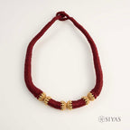 Red thread with gold semi Gundu