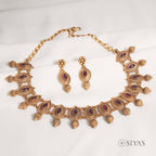 Intricated red stone necklace