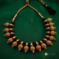 Black thread with gold motifs