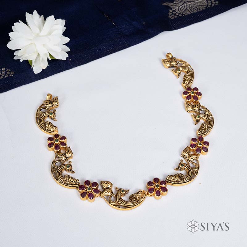 Antique peacock design with red flower