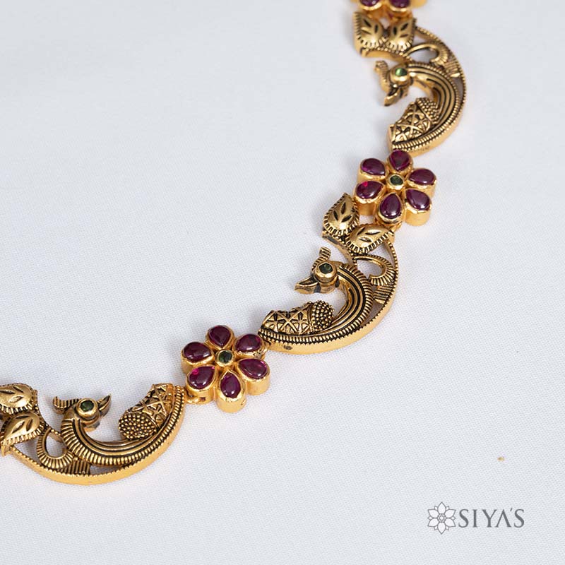 Antique peacock design with red flower