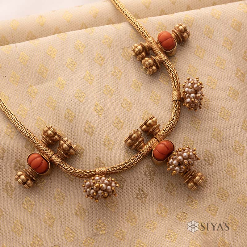 Coral and pearl antique chain