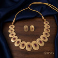 Tribal oval with red stones