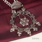 Pearl chain with round ruby pendant
