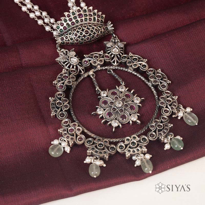 Pearl chain with round ruby pendant