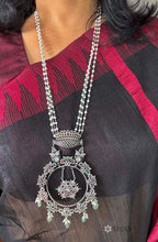 Pearl chain with round ruby pendant