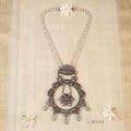Pearl chain with round ruby pendant