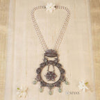 Pearl chain with round ruby pendant