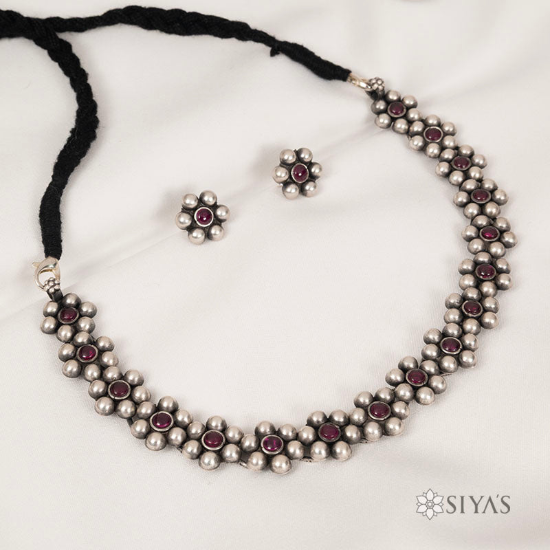 Oxidised flower necklace with studs