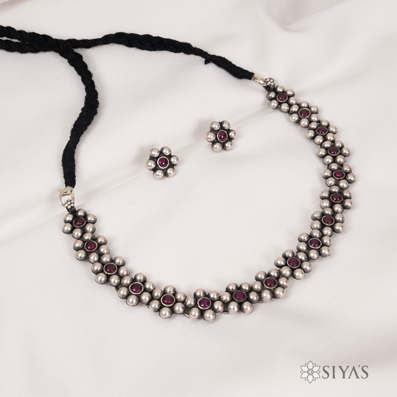 Oxidised flower necklace with studs