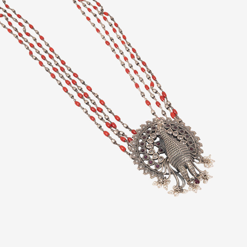Peacock with coral long chain