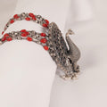 Peacock with coral long chain
