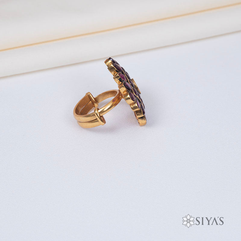 Diamond shaped red stone ring