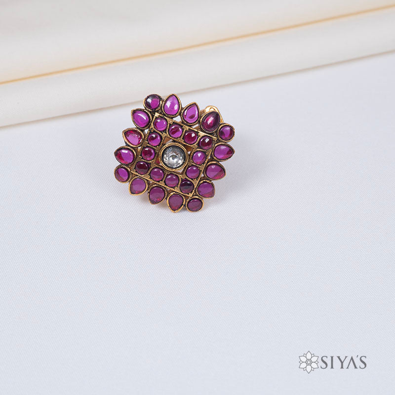 Diamond shaped red stone ring