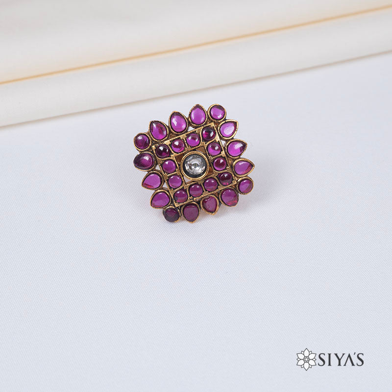 Diamond shaped red stone ring