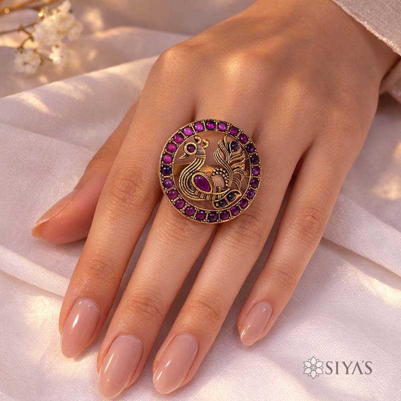 Stunning Peacock in red stones