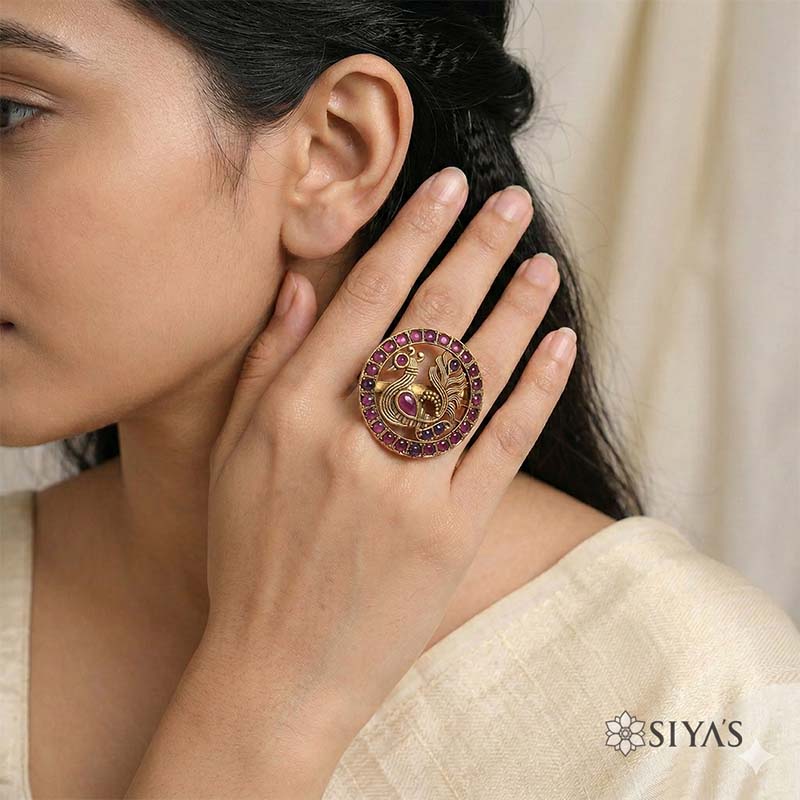 Stunning Peacock in red stones