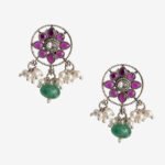 Red flower with pearl and green drop